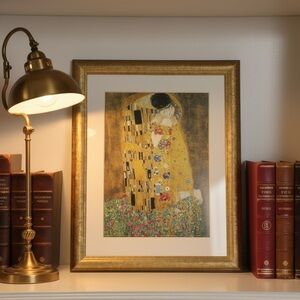 The Kiss Framed Art Print (Small) in a Acrylic Gold Frame